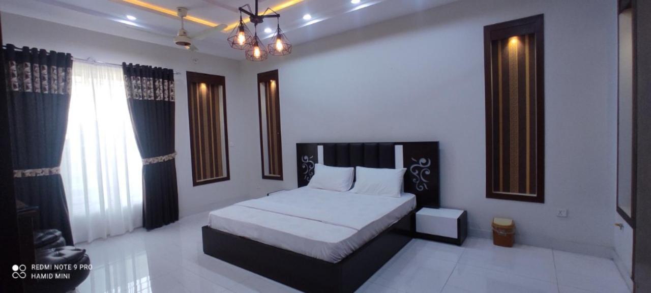 Islamabad Travelodge Guest House Exterior foto