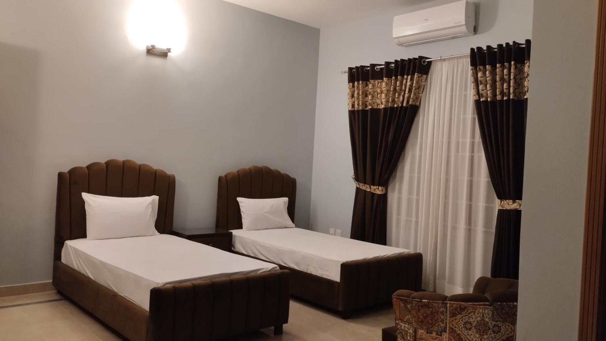 Islamabad Travelodge Guest House Habitación foto